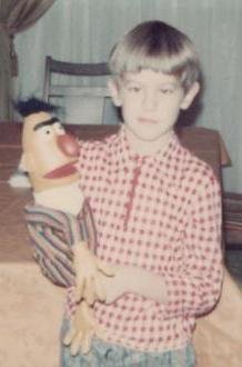 David, age eight, poses at home with a famous television celebrity, 1973.